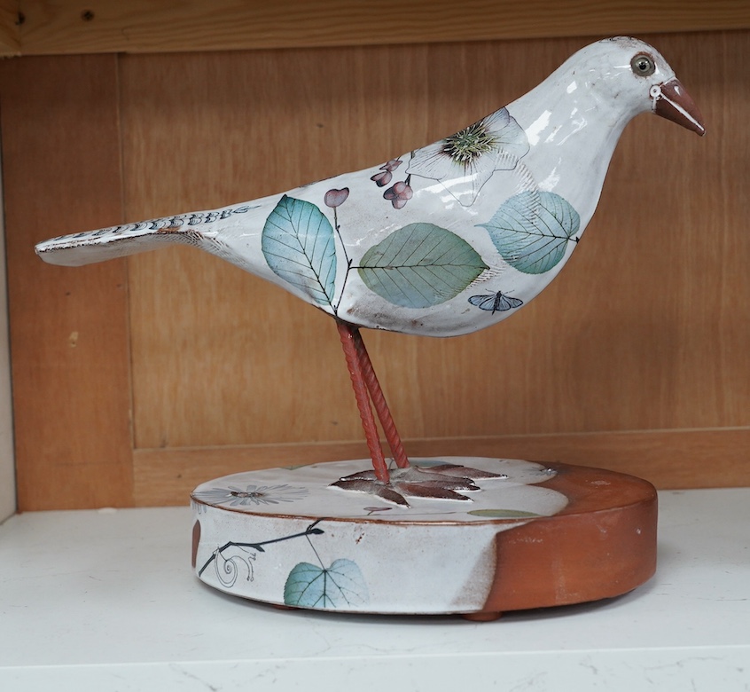 Marion Brandis (Modern British), a partially tin glazed art pottery model of a bird, 28cm tall. Condition - good